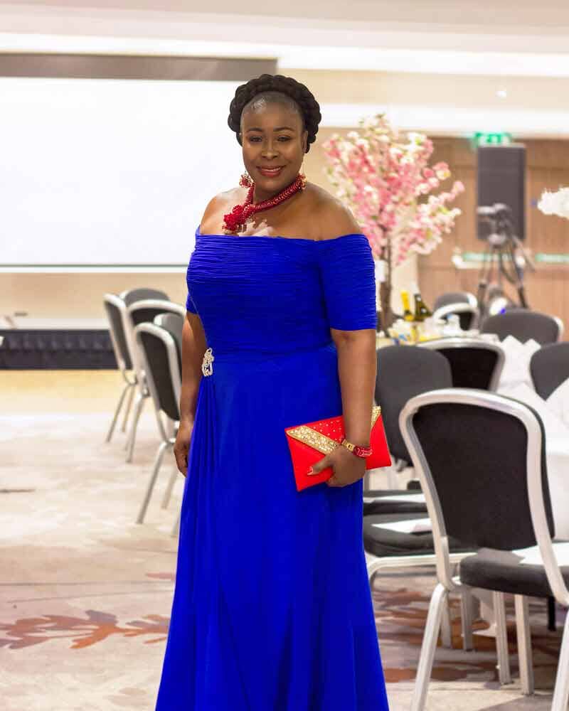 Corniela wearing Royal blue evening gown for her Creating New Beginnings charity event